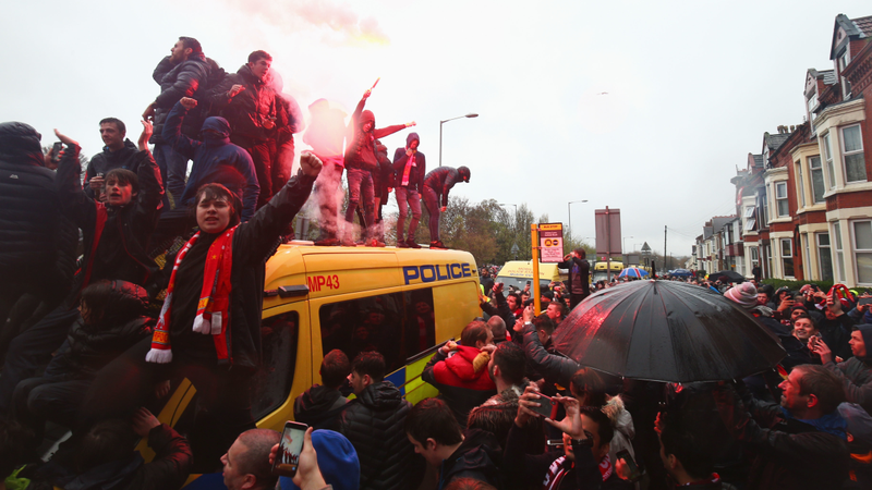 Illustration for article titled Liverpool Fans Get Rowdy, Hop On Police Vans